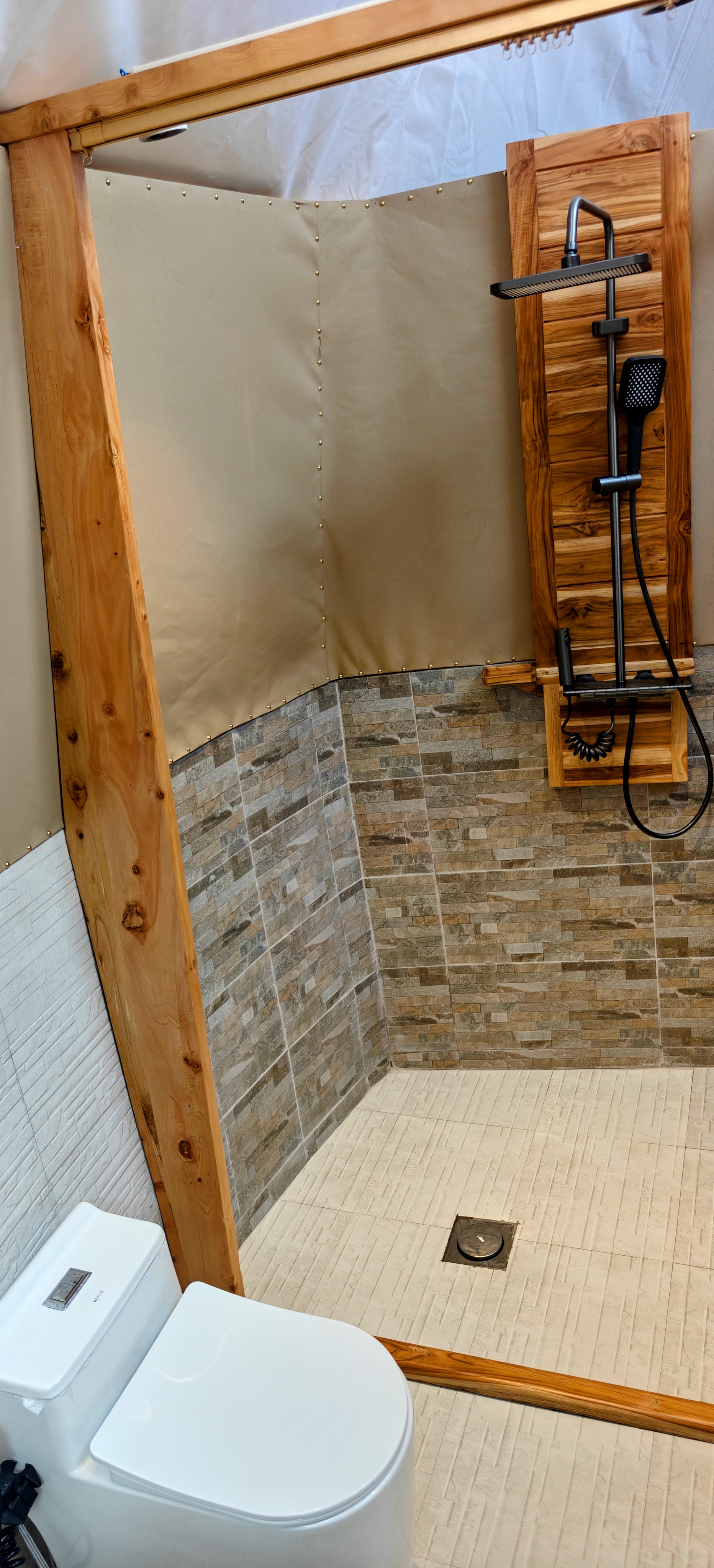 Stone and timber rainfall ensuite shower
